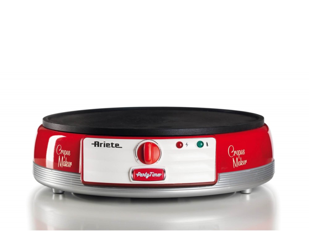 Crepera roja con ribete plateado, fondo blanco. El dial de control es prominente.