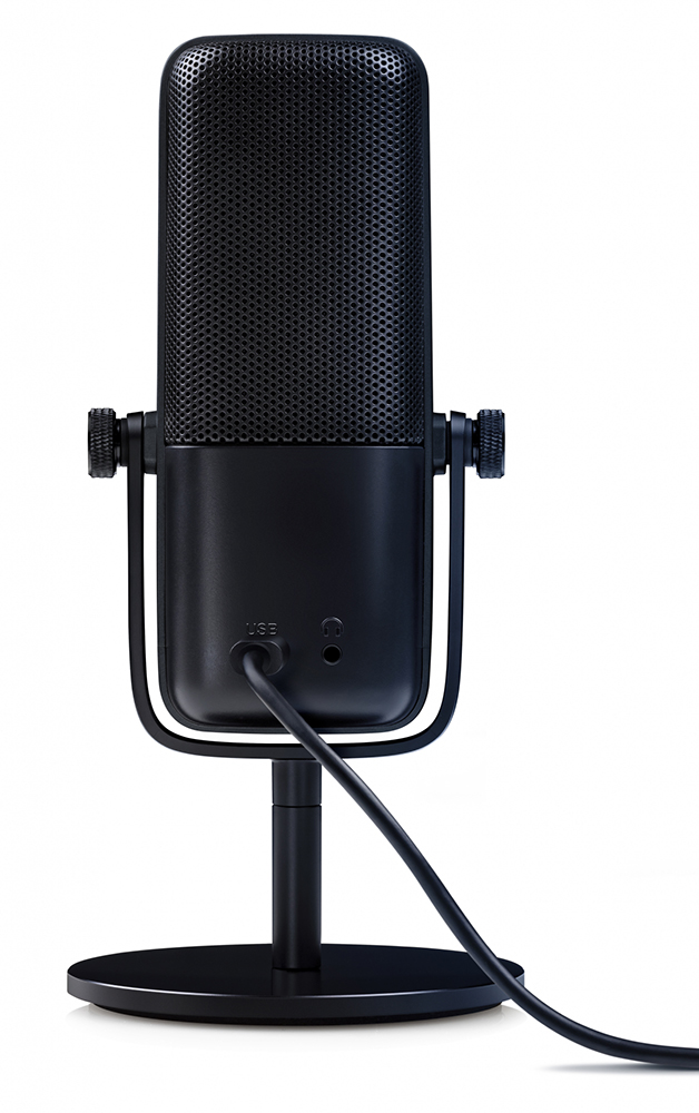Black microphone with a mesh head, USB port, and a stand, against a white background.