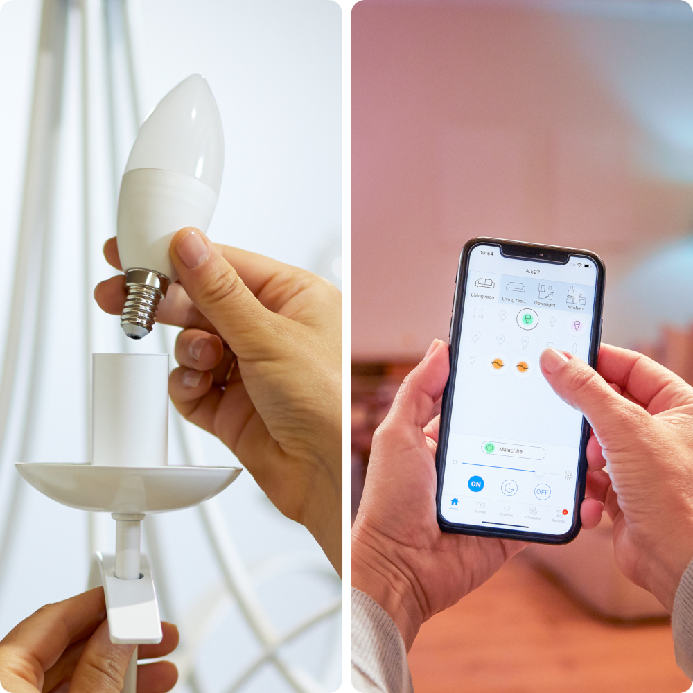 A person changing a lightbulb and using a smartphone with smart home app.