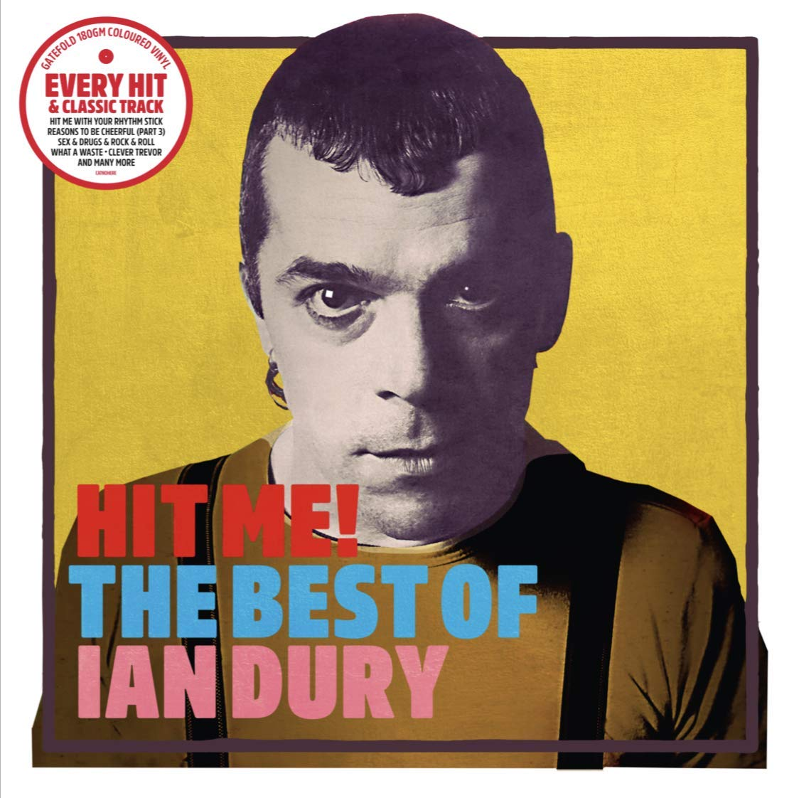 Album borító: Ian Dury portré sárga háttérrel. Szöveg: "Hit Me! The Best of Ian Dury". Tartalmazza a számlistát és a bakelit infót.