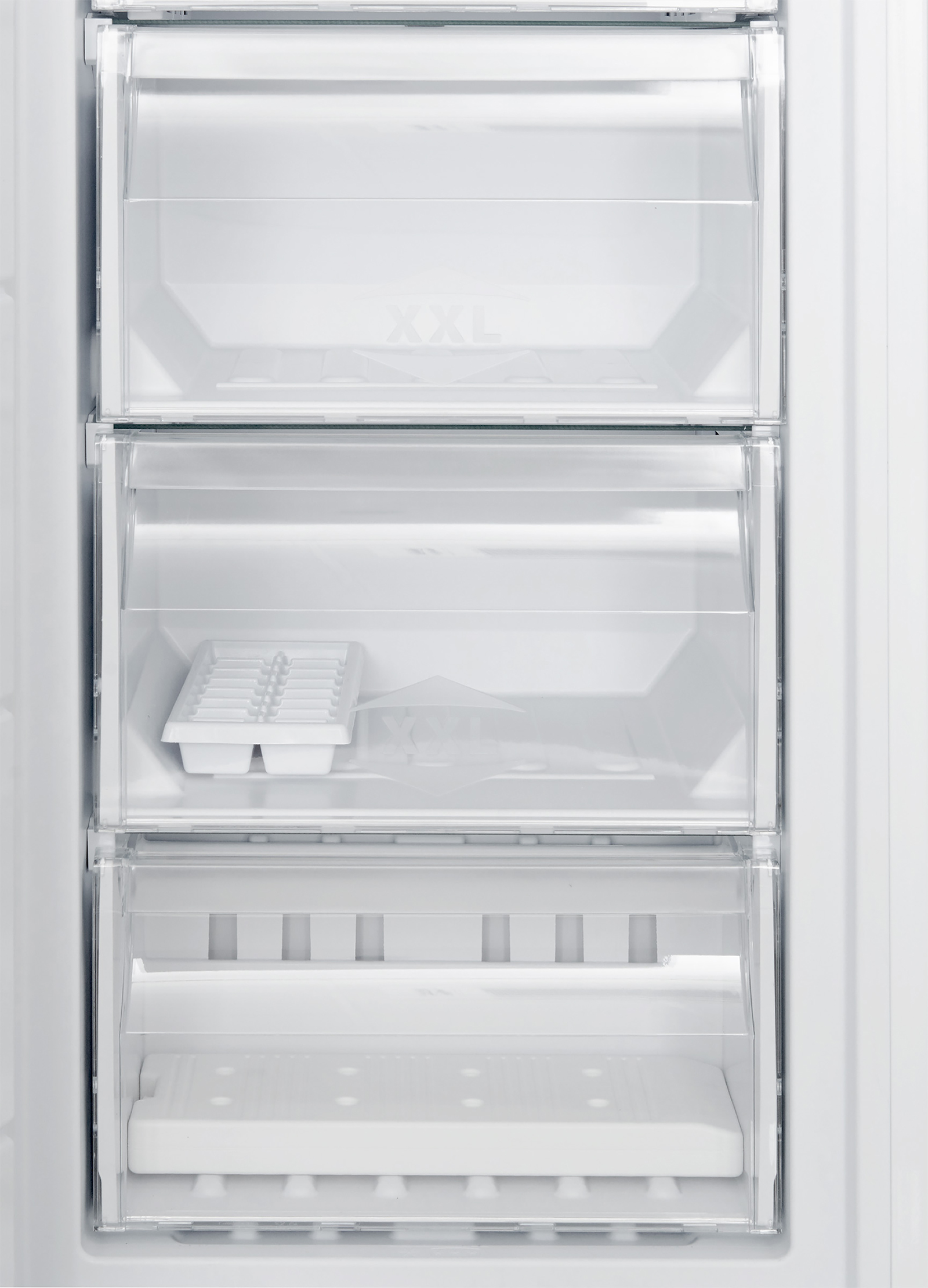 Freezer compartments. Top section marked XXL. Ice tray in middle. Bottom section has a shelf.