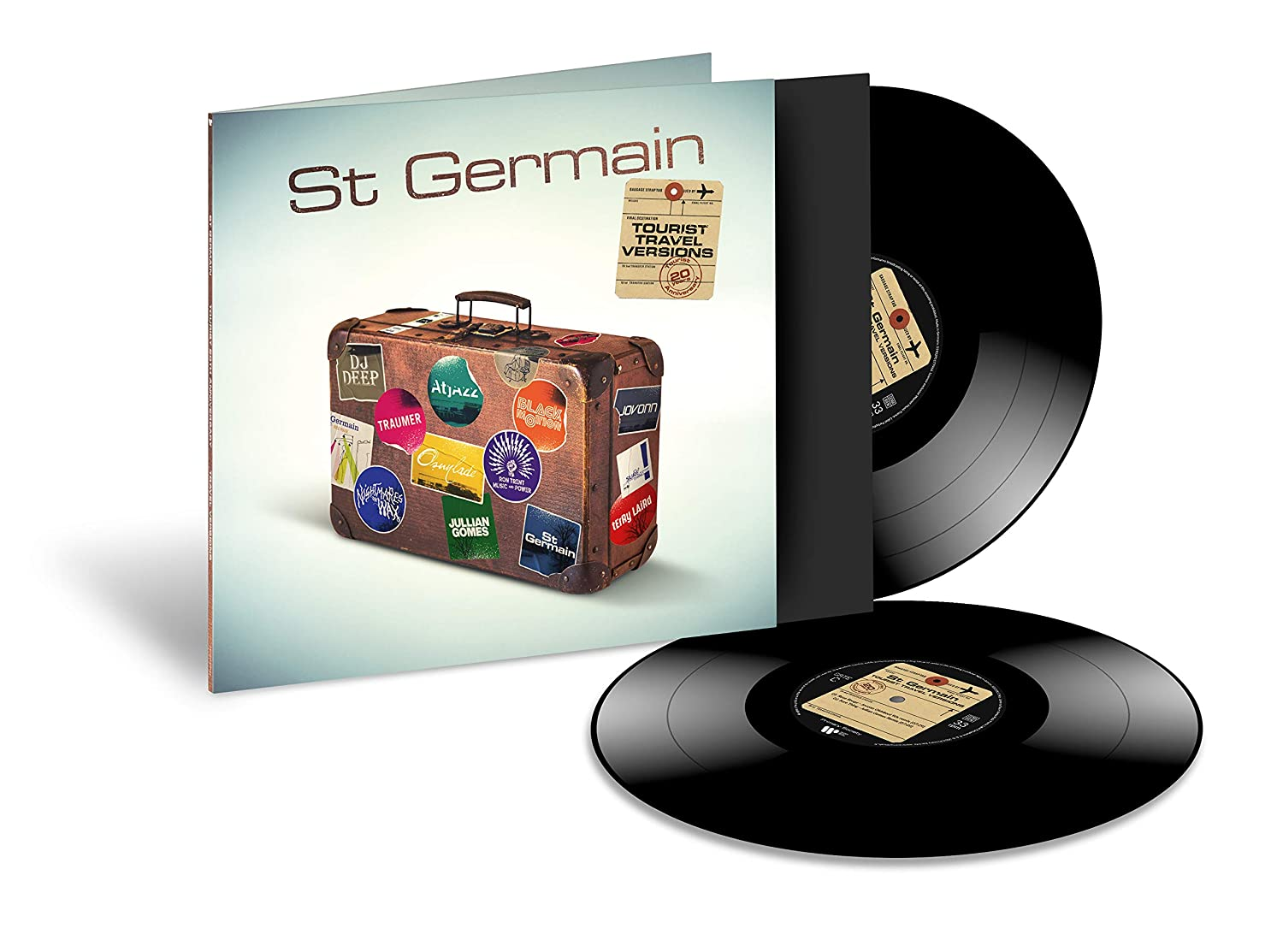 St Germain album borító bőrönddel és bakelit lemezekkel. Fehér háttér.