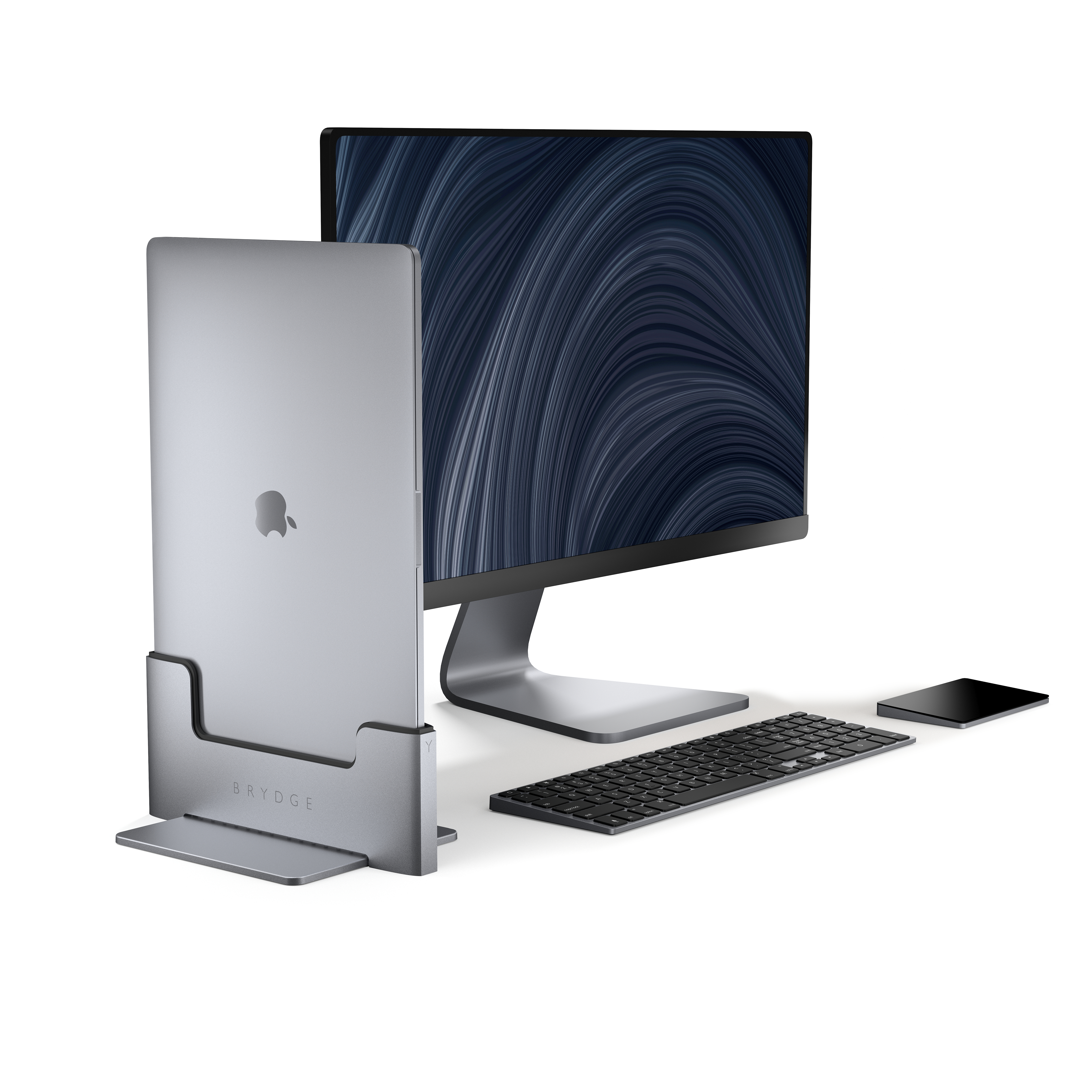 Ein silberner Laptopständer mit einem Laptop, einem Monitor, einer Tastatur und einem Telefon.