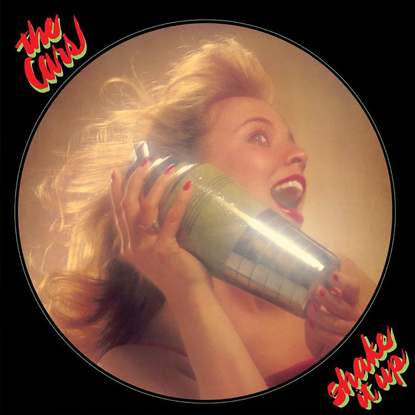 Album borító egy nővel, aki koktélrázót tart. A The Cars logója bal felül.