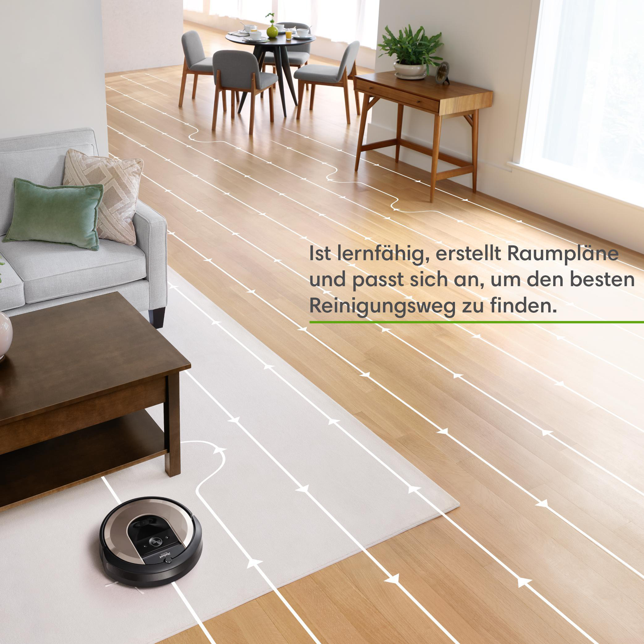 Roboterstaubsauger auf Holzboden mit Pfadlinien.