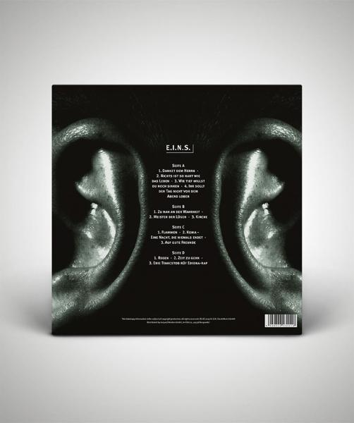 Albumcover mit dem Albumtitel "E.I.N.S." und einem Schwarz-Weiß-Bild von zwei Ohren.