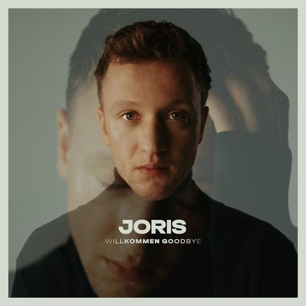 Albumcover. Das Gesicht eines Mannes in der Mitte mit einem verschwommenen Duplikat dahinter.