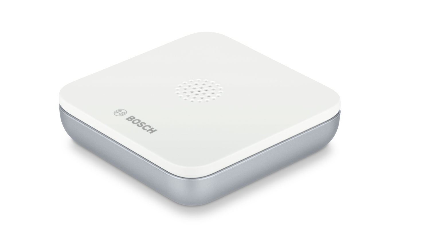 Ein weißes und silbernes Bosch Smart-Home-Gerät, quadratisch, mit Lautsprecher.