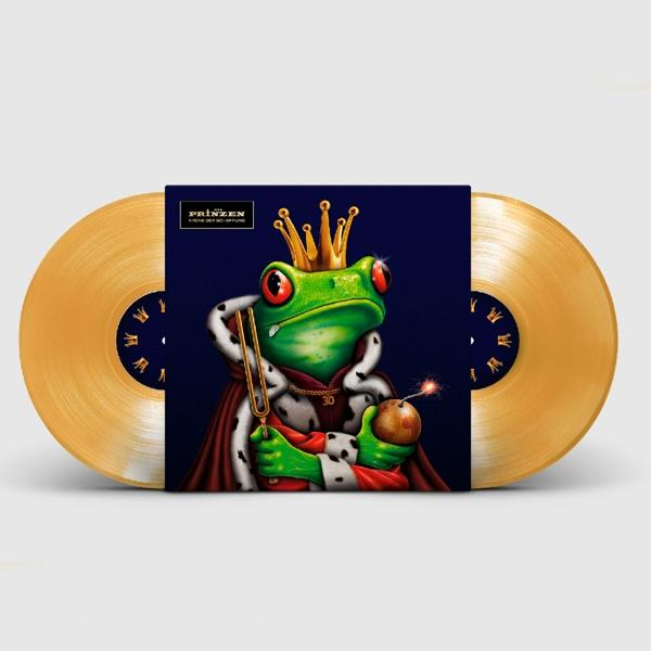Doppel-LP aus goldfarbenem Vinyl. Das Cover zeigt einen Frosch mit Krone, der eine Bombe und eine Stimmgabel hält.