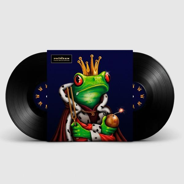 Albumcover mit einem Cartoon-Froschkönig, der eine Stimmgabel und eine Bombe hält.