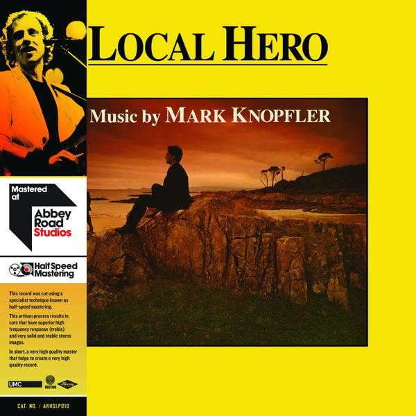 Albumcover mit einem Mann auf einem Felsen, Text 'Local Hero' und 'Abbey Road Studios'.