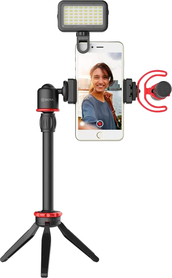 Smartphone sur un trépied avec une lumière et un microphone attachés, prêt à filmer.