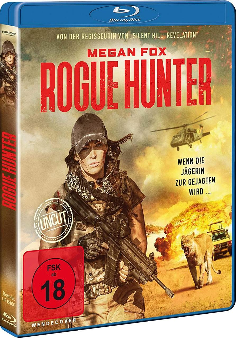 Blu-ray-Box-Art mit Megan Fox, einem Hubschrauber und einem Löwen in einer Wüstenszene.