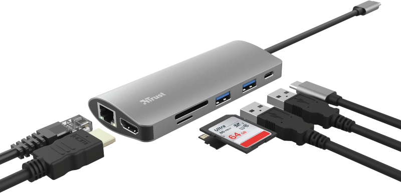 Ezüst hub több porttal és csatlakoztatott kábellel. Ethernetet, USB-t és kártyaolvasót tartalmaz.