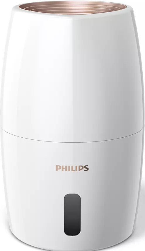 Un humidificateur Philips blanc avec un dessus doré et un indicateur de niveau d'eau gris foncé.