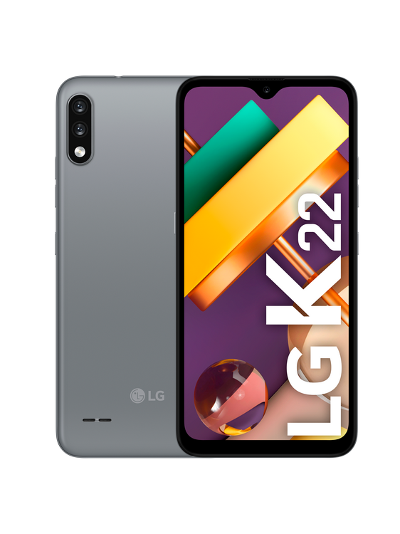 Un teléfono móvil sobre una superficie gris. La pantalla muestra una pantalla colorida.
