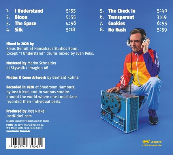 Rückseite einer CD-Hülle mit Titelliste und einem Mann.