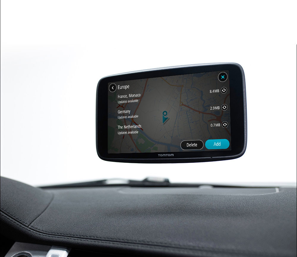TomTom GPS on car dashboard displaying a map. Europe map selected.