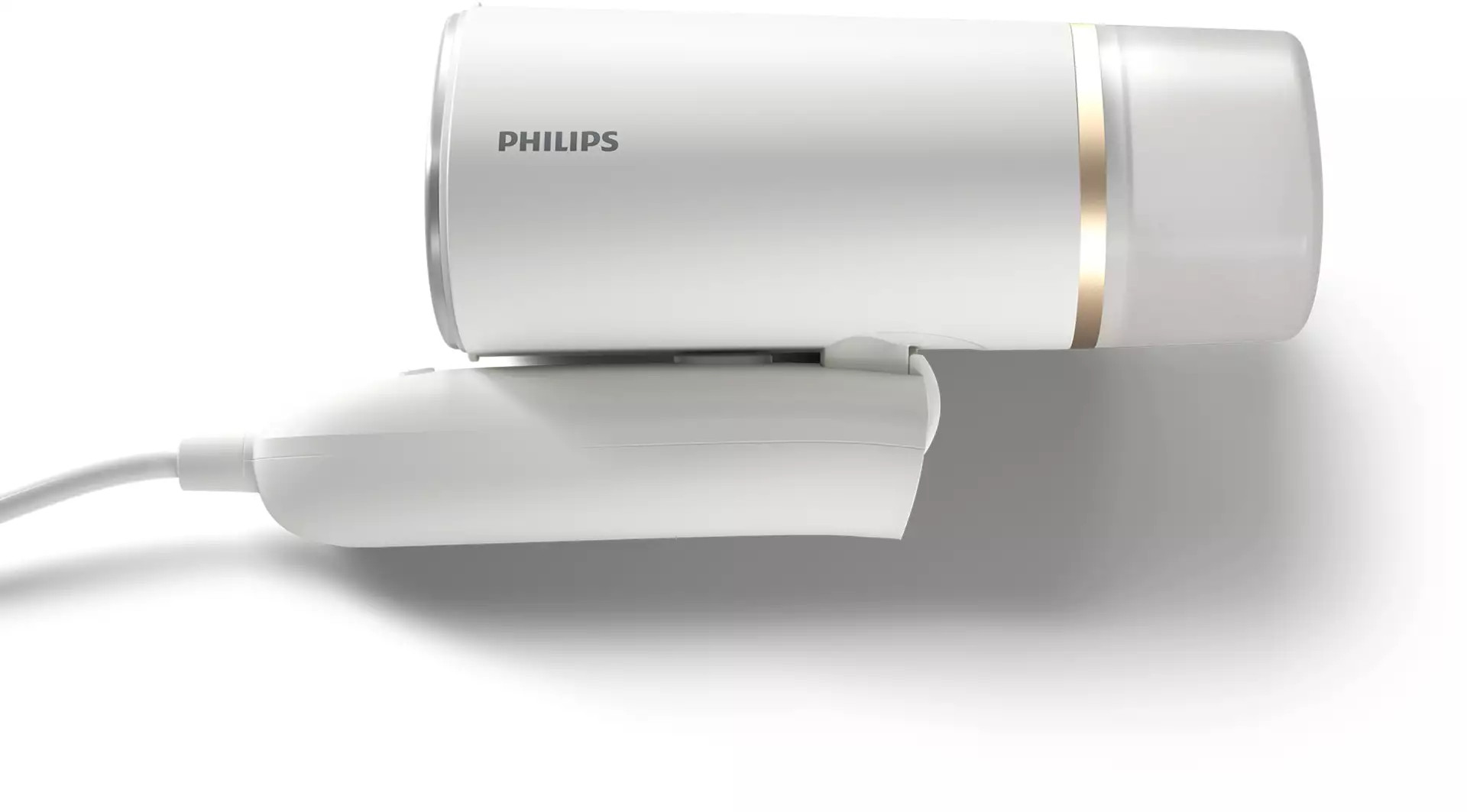 Fehér Philips webkamera arany díszítéssel. Fehér felületen van.