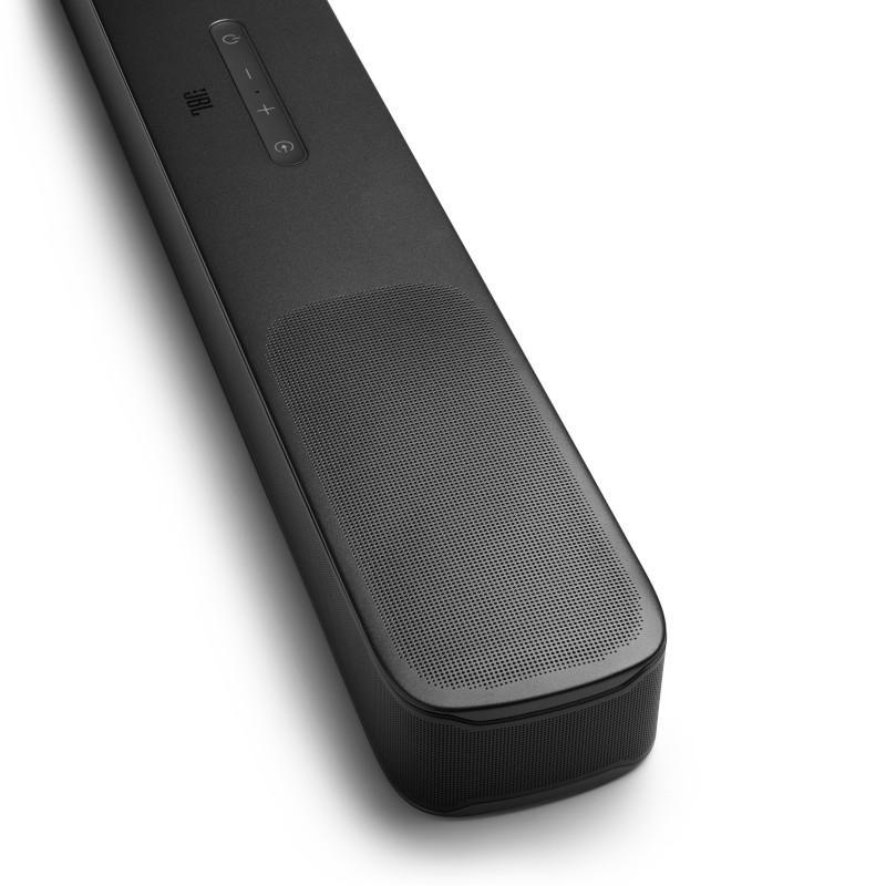 Nahaufnahme einer JBL Soundbar-Ecke, die das Lautsprechergitter und die Bedienelemente zeigt.