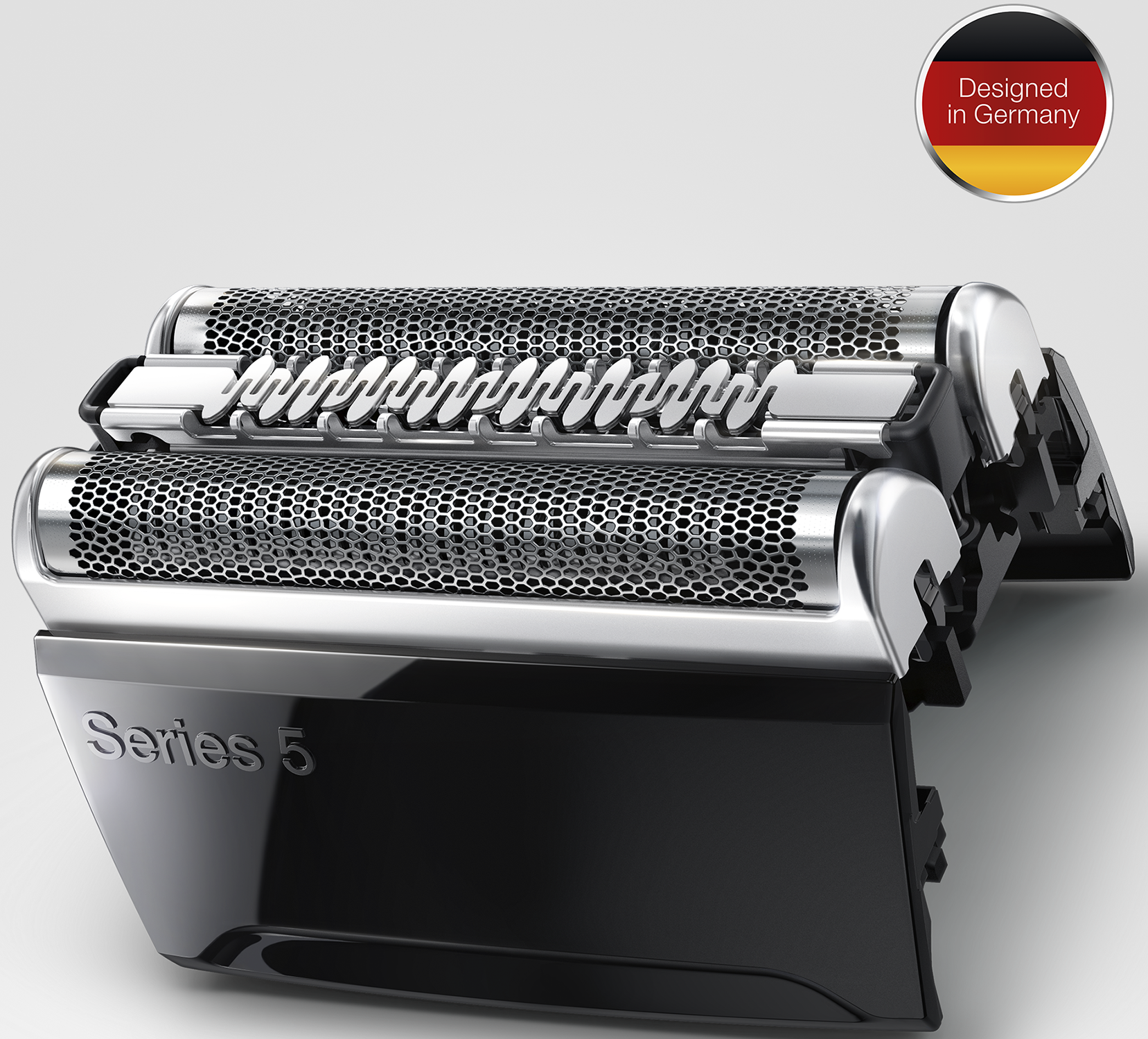 A shaving head with three silver mesh blades.