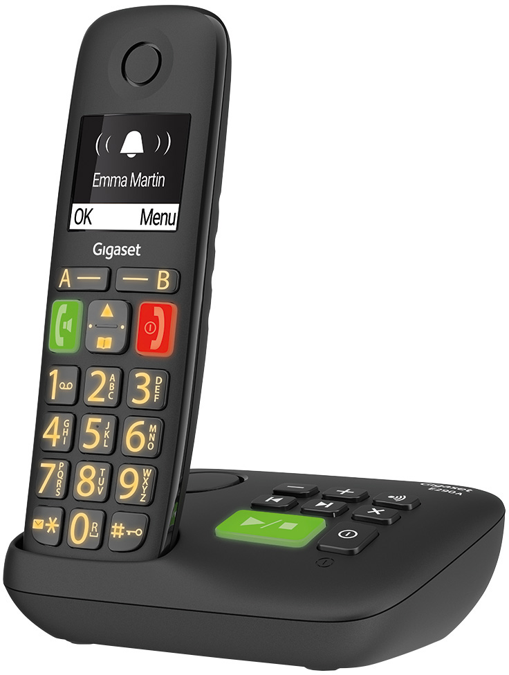 Egy fekete vezeték nélküli telefon, képernyővel, amely egy nevet mutat.