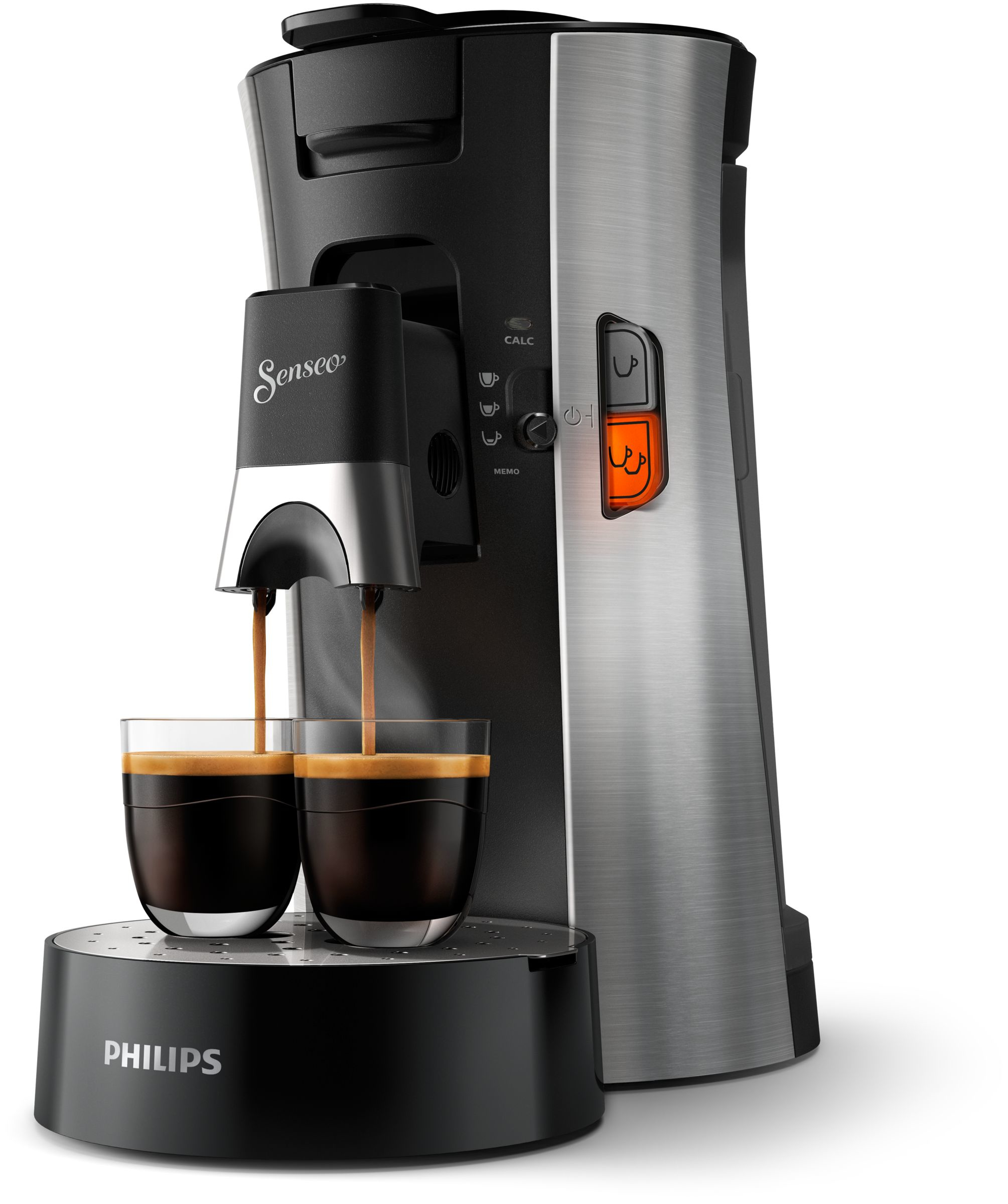 Eine silberne und schwarze Kaffeemaschine, die Kaffee in zwei Gläser auf einem schwarzen Sockel ausgibt.