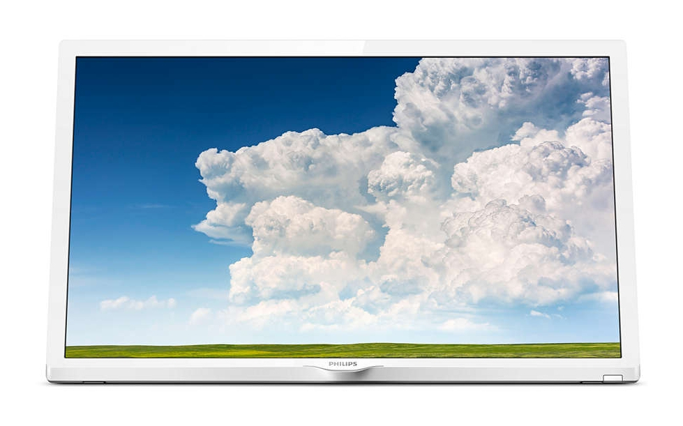 Monitor de ordenador blanco que muestra un cielo azul con nubes blancas y esponjosas.