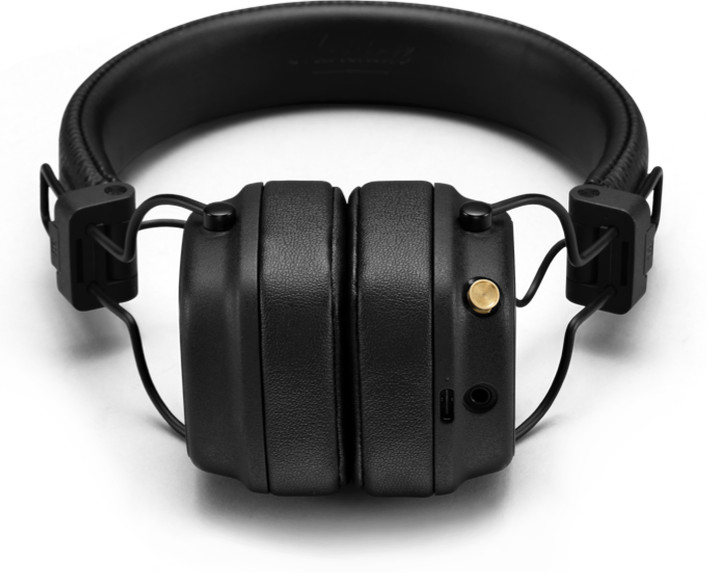 Black Marshall headphones, top view, white background.
