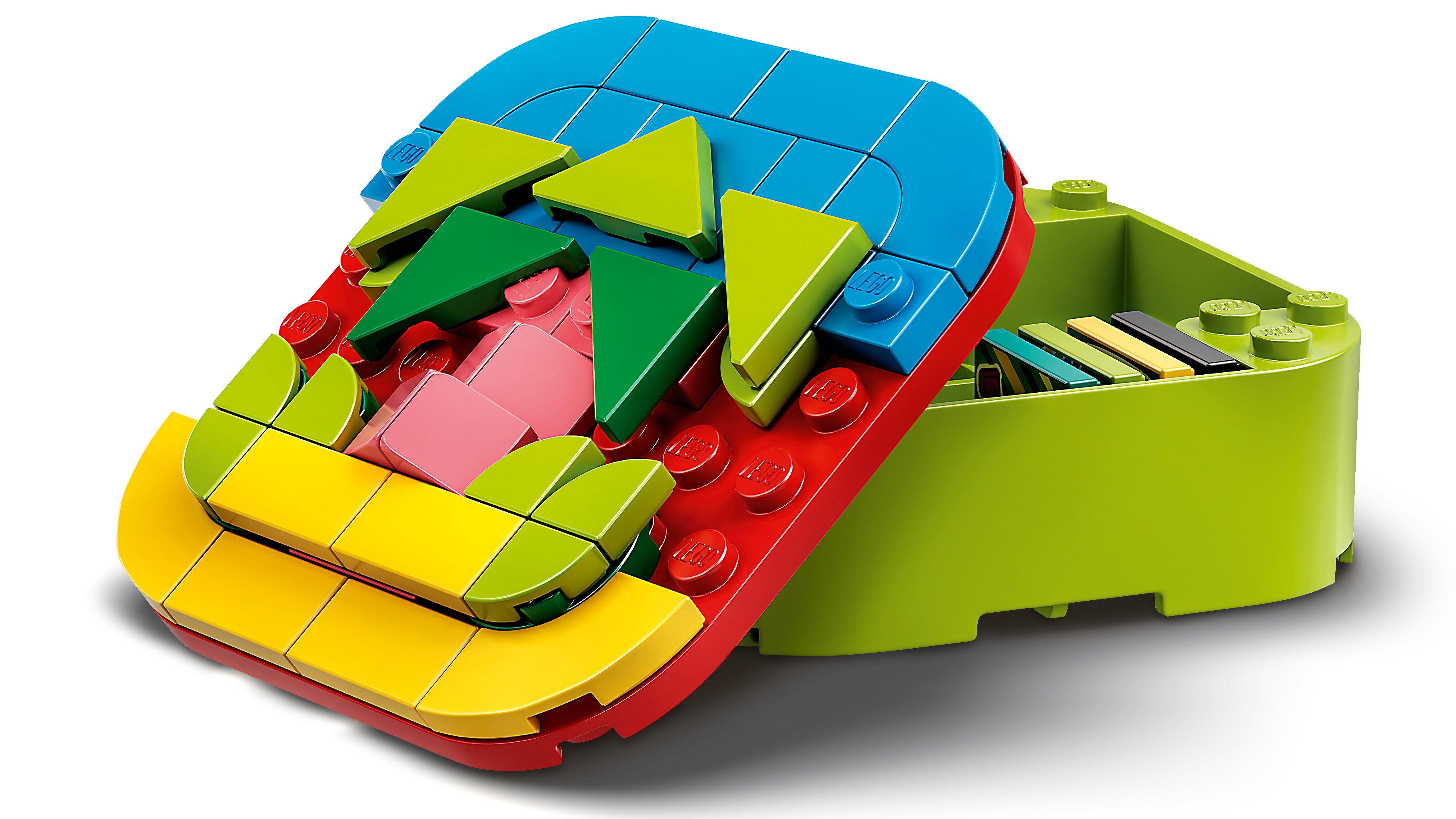 Geöffnete LEGO-Aufbewahrungsbox mit roten, gelben, grünen und blauen Blöcken.
