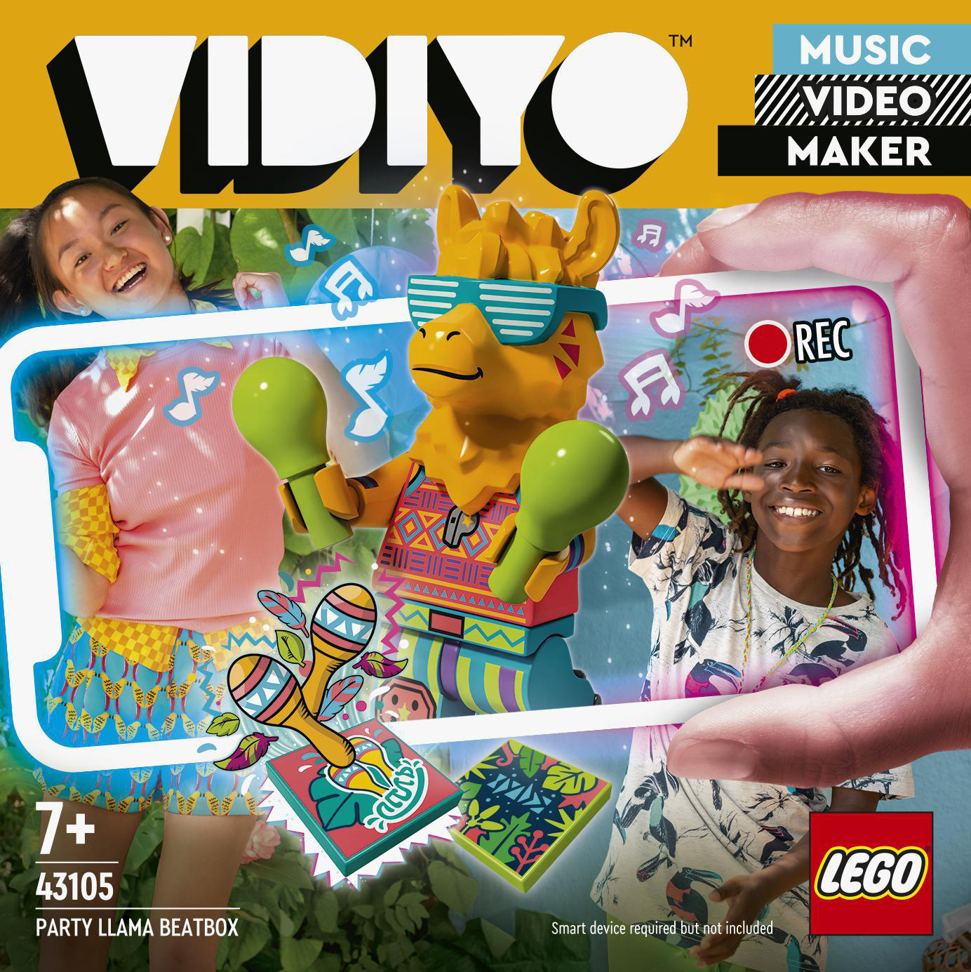 LEGO-Set, eine Lamafigur mit Maracas und zwei Kinder halten ein Telefon und lächeln.