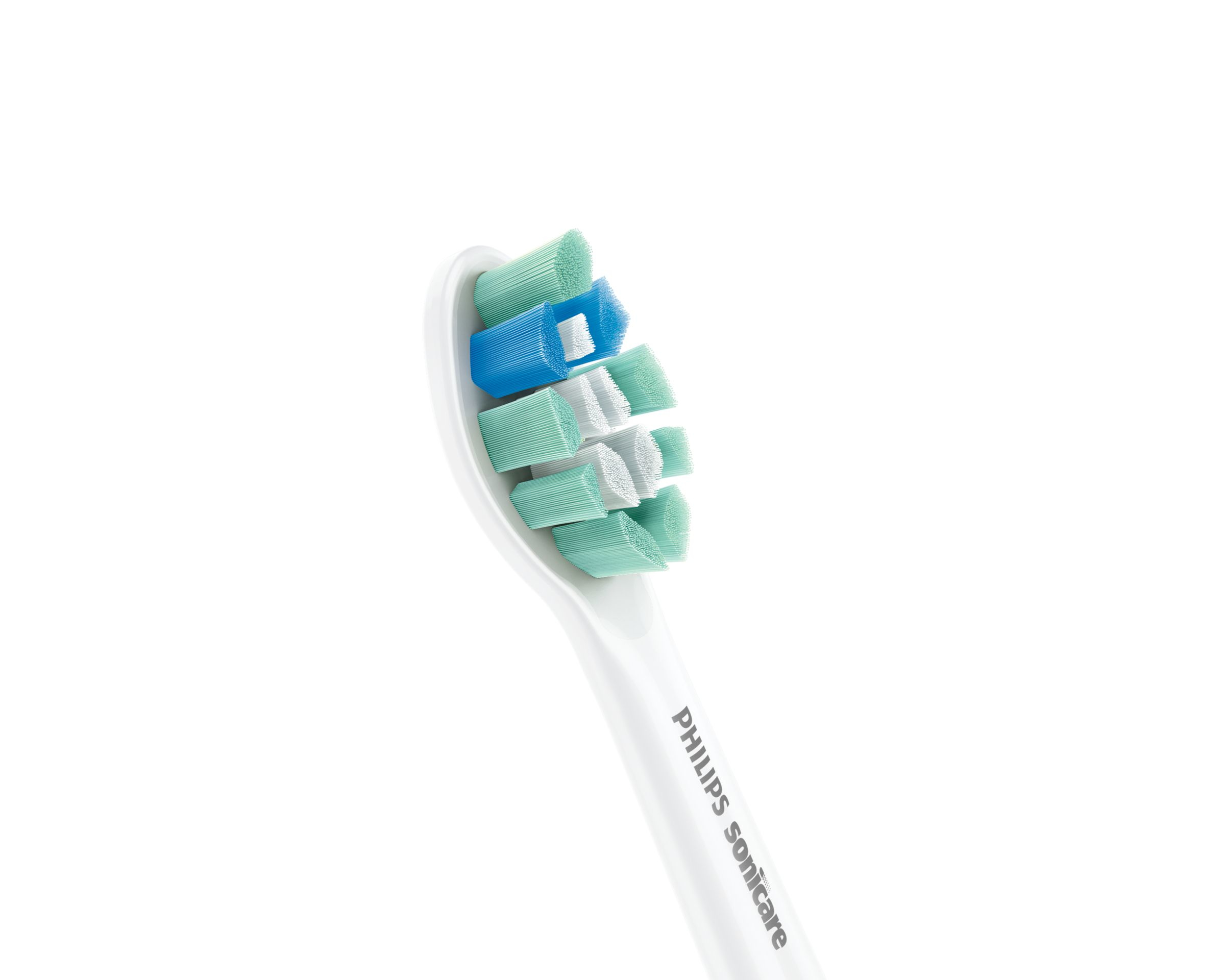 Un cabezal de cepillo de dientes blanco con cerdas verdes y azules, sobre un fondo blanco.
