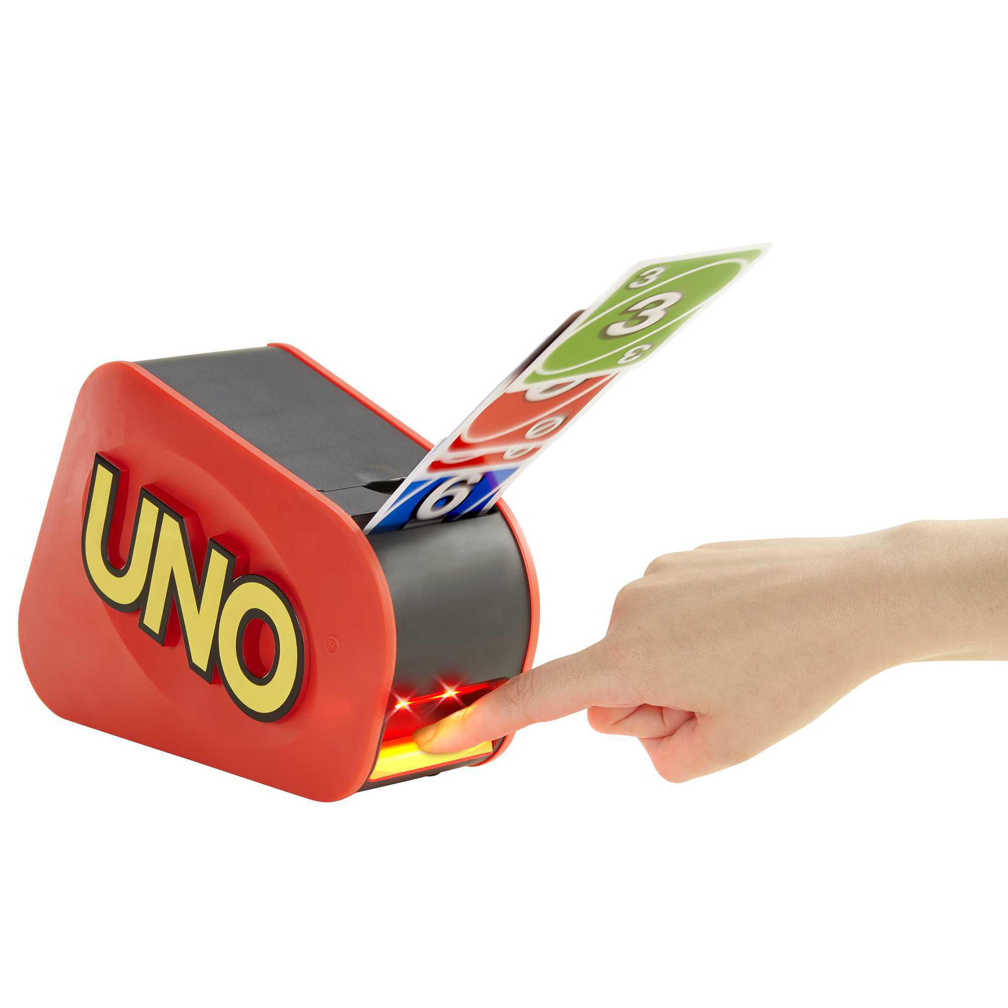 Die Hand einer Person drückt eine Taste auf einem roten UNO-Kartenspielspender.
