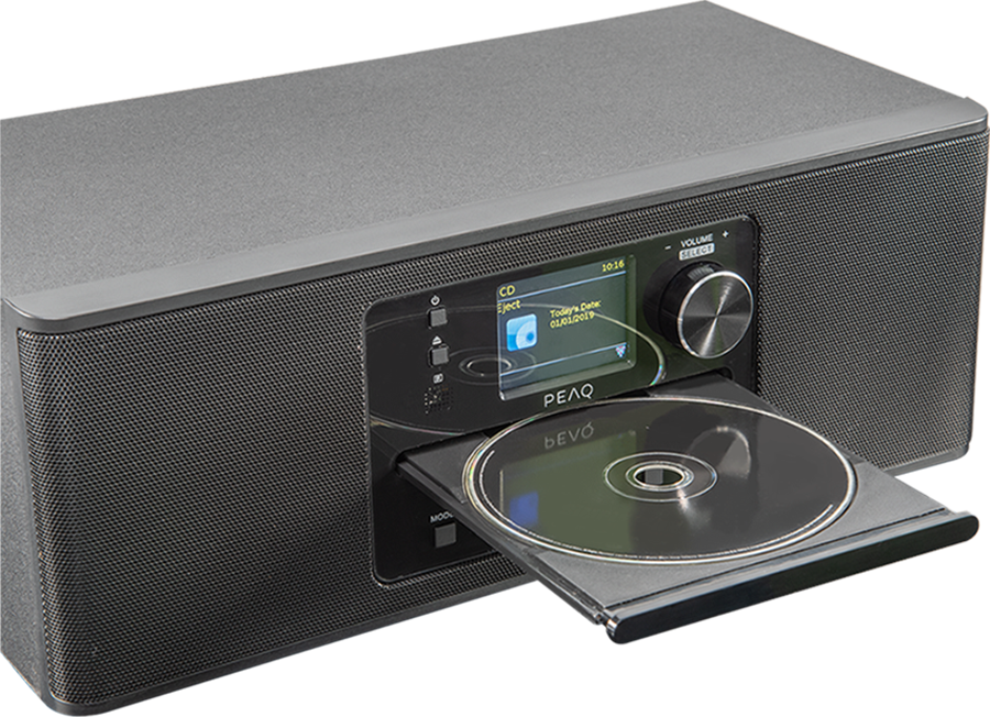 Gray stereo system with a CD in the tray. White background.