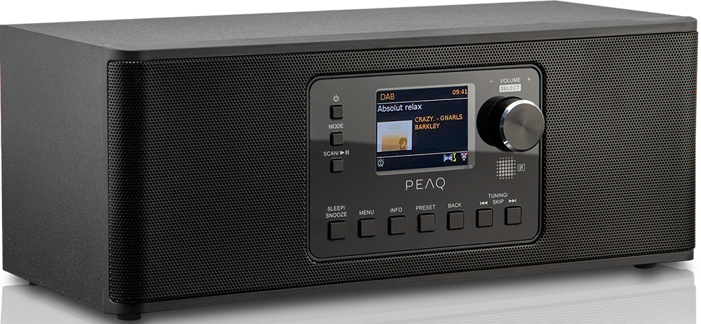 Black digital radio with a display showing the time and radio station info.