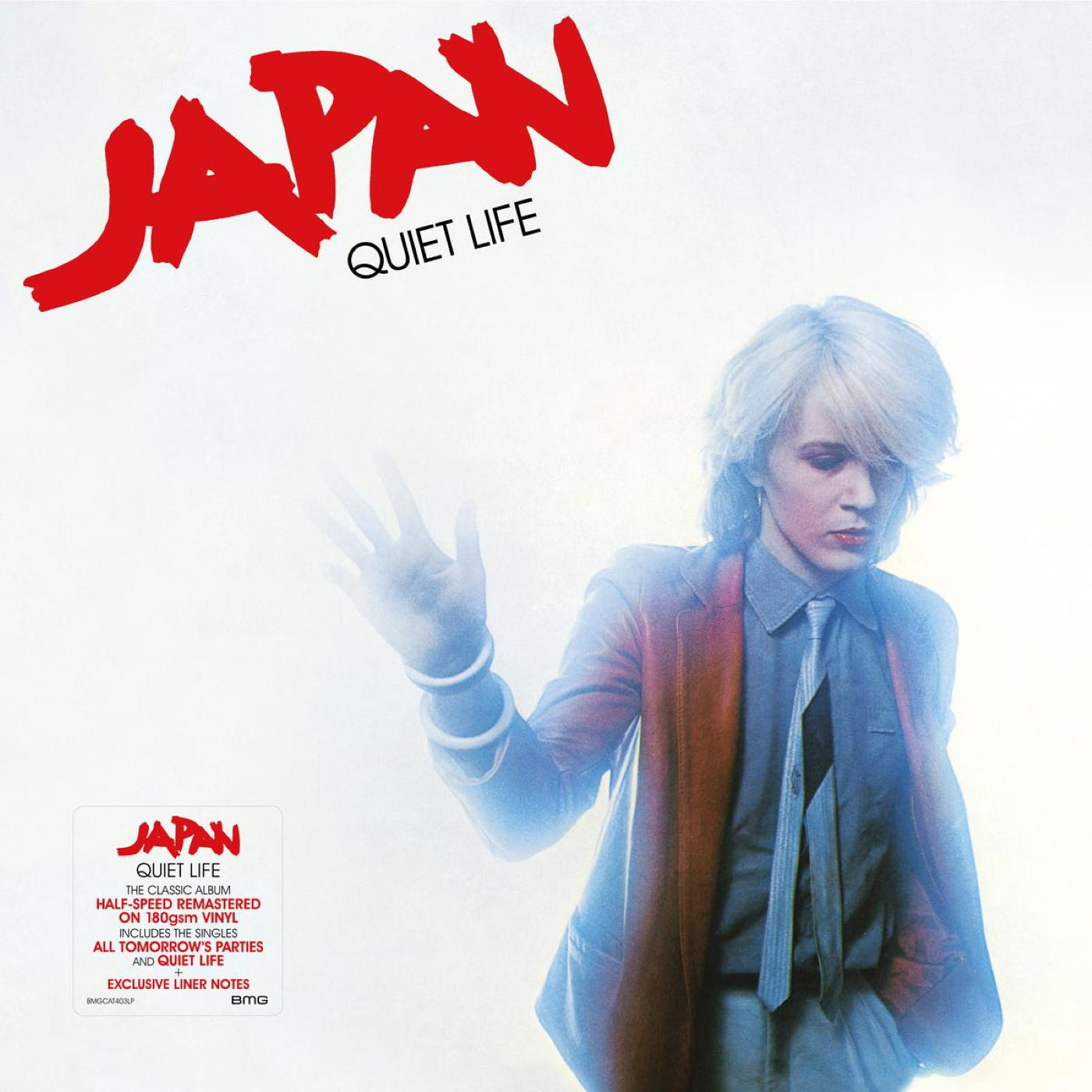 Pochette d'album : Homme aux cheveux blonds, regardant en bas, mains en l'air. Texte : Japan, Quiet Life.