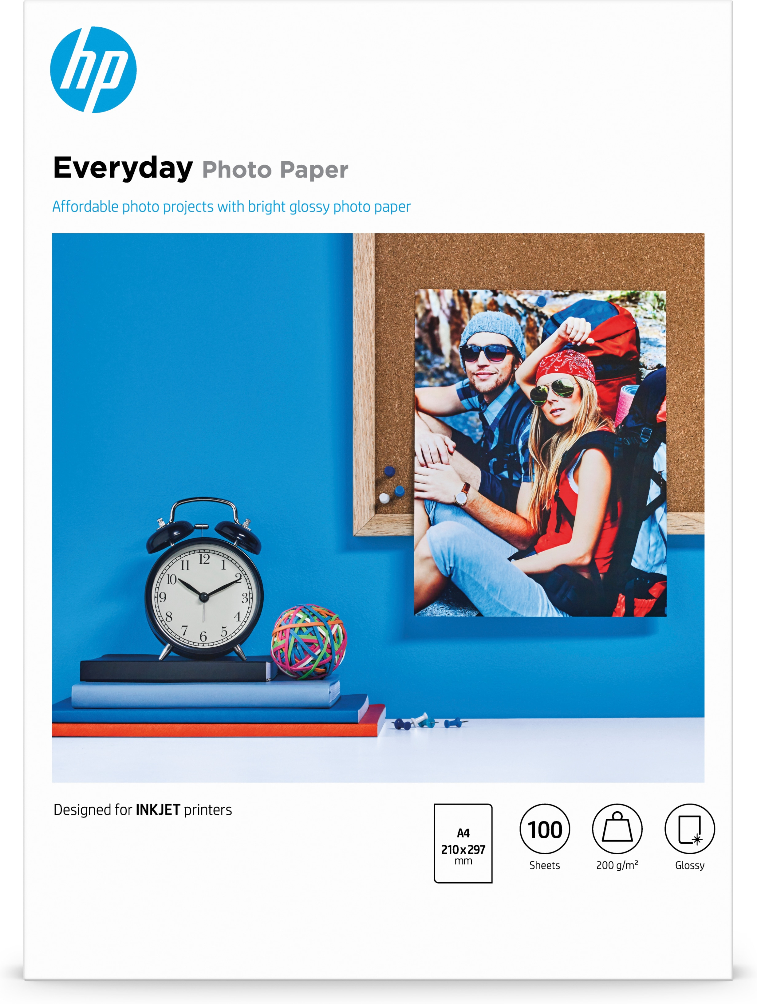 Fotopapierbox mit Bild eines Paares, blauer Hintergrund.