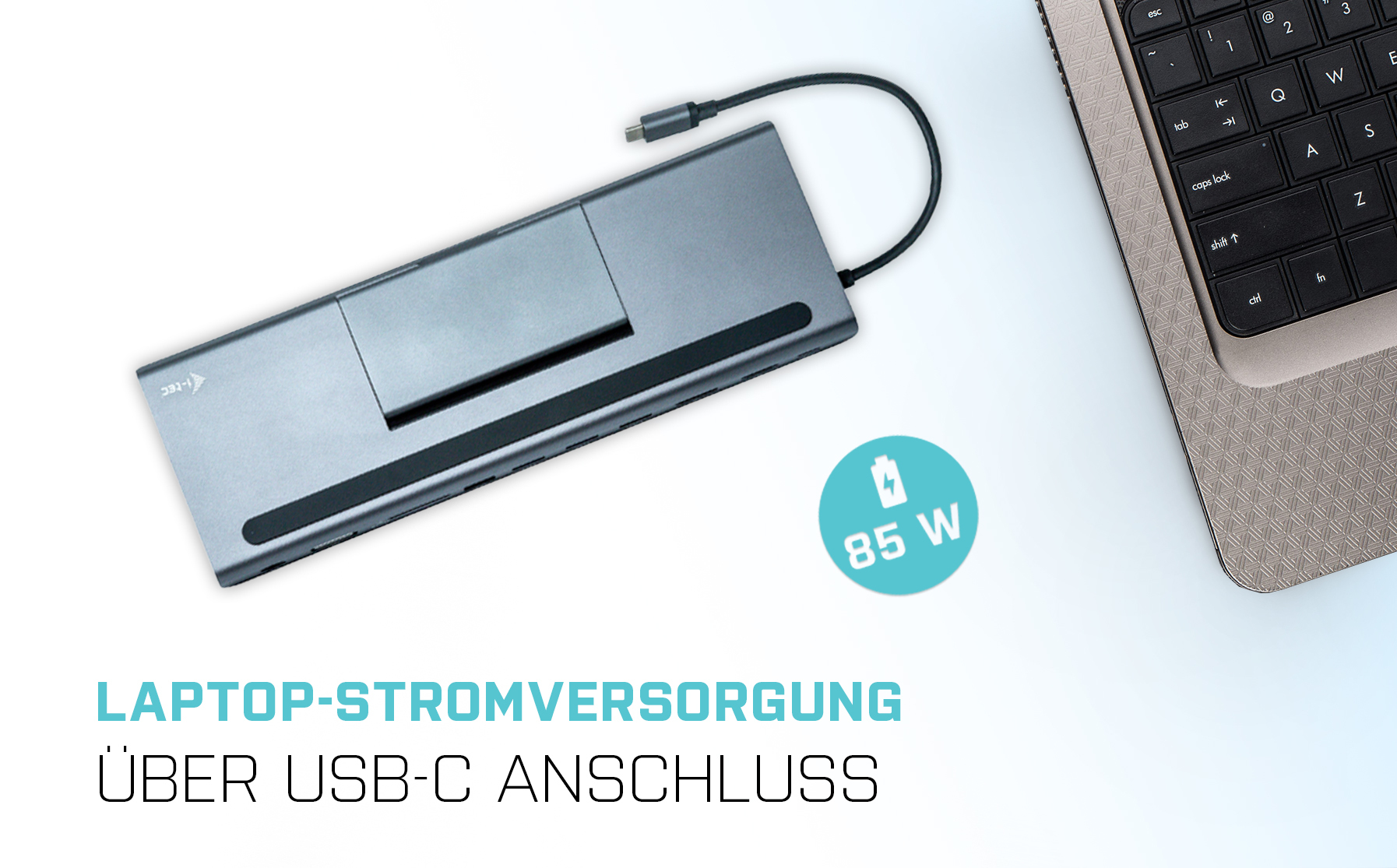 Silbernes Laptop-Netzteil, das mit einem Laptop verbunden ist, mit 85W-Aufkleber.