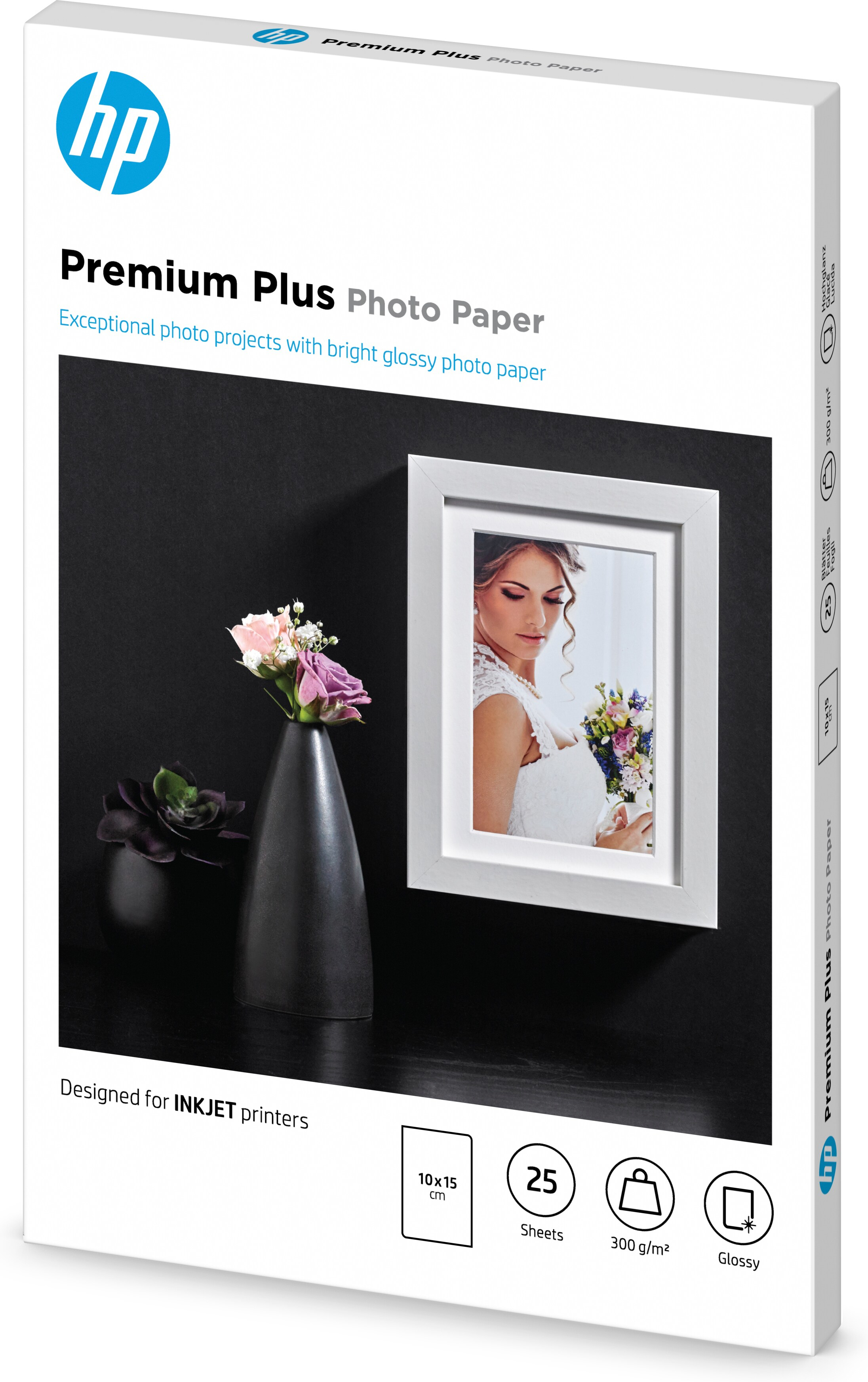 Fotopapierbox mit Foto und Blumen, auf schwarzem Untergrund, mit Text und Logo.