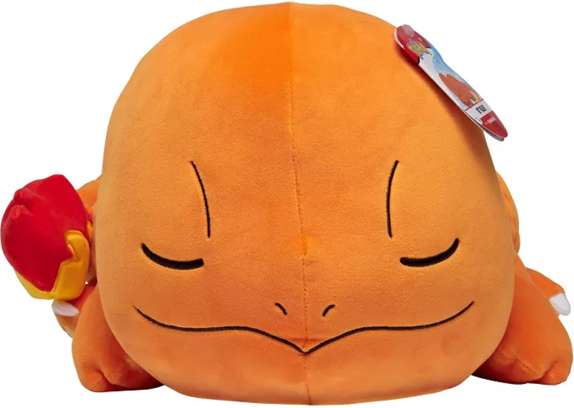 Peluche Charmander arancione, che dorme.