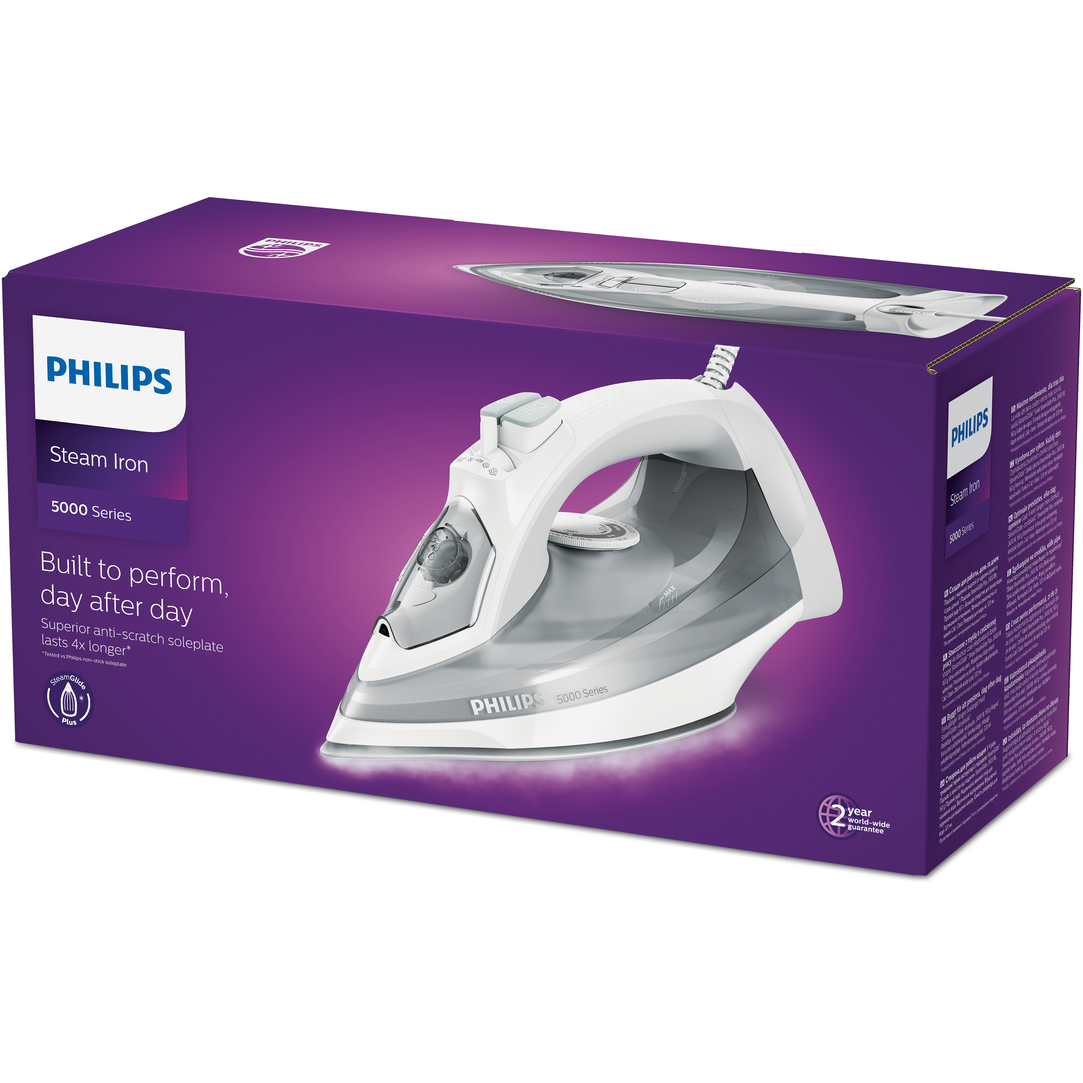 Ein Philips Dampfbügeleisen in seiner Box. Bügeleisen ist weiß und grau. Box ist lila mit Produktinfo.