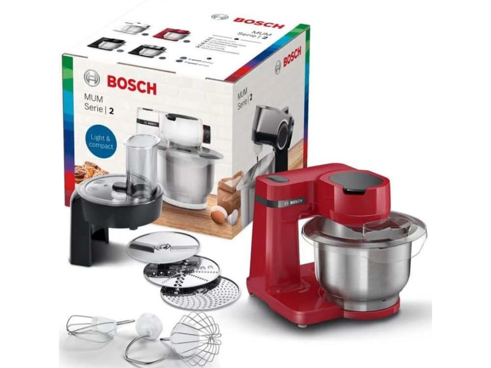 Una batidora de pie Bosch roja con accesorios y una caja. Fondo blanco.