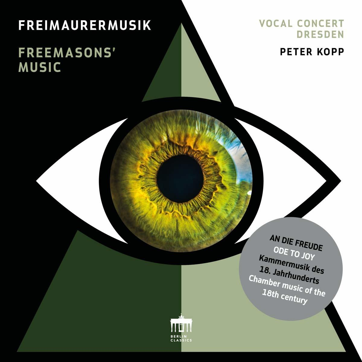 Albumcover 'Freimaurermusik' mit einem Auge in der Mitte und einem umgekehrten grünen Dreieck.