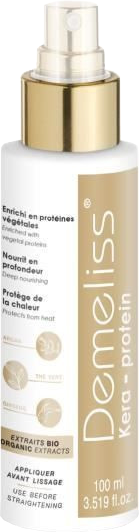 Haarproductfles. Witte fles met gouden dop. Tekst in het Frans en Engels.