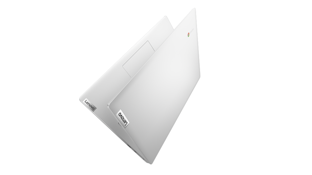 Ordenador portátil blanco con el logotipo de Lenovo en la parte superior y frontal, abierto en ángulo, fondo negro.