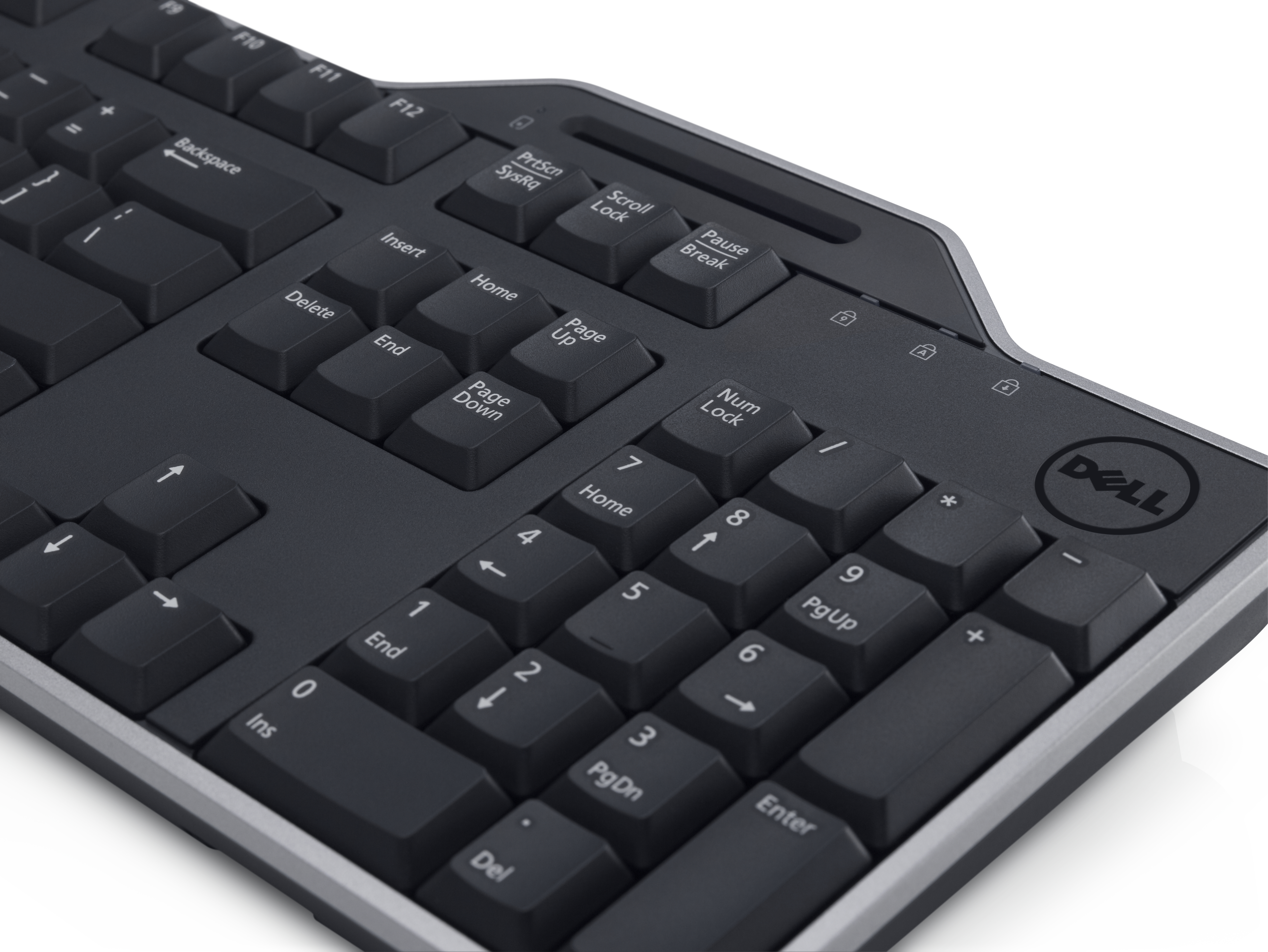 Eine schwarze Dell-Tastatur mit Tasten wie Rücktaste, Löschen, Eingabe und Funktionstasten. Das Dell-Logo ist sichtbar.