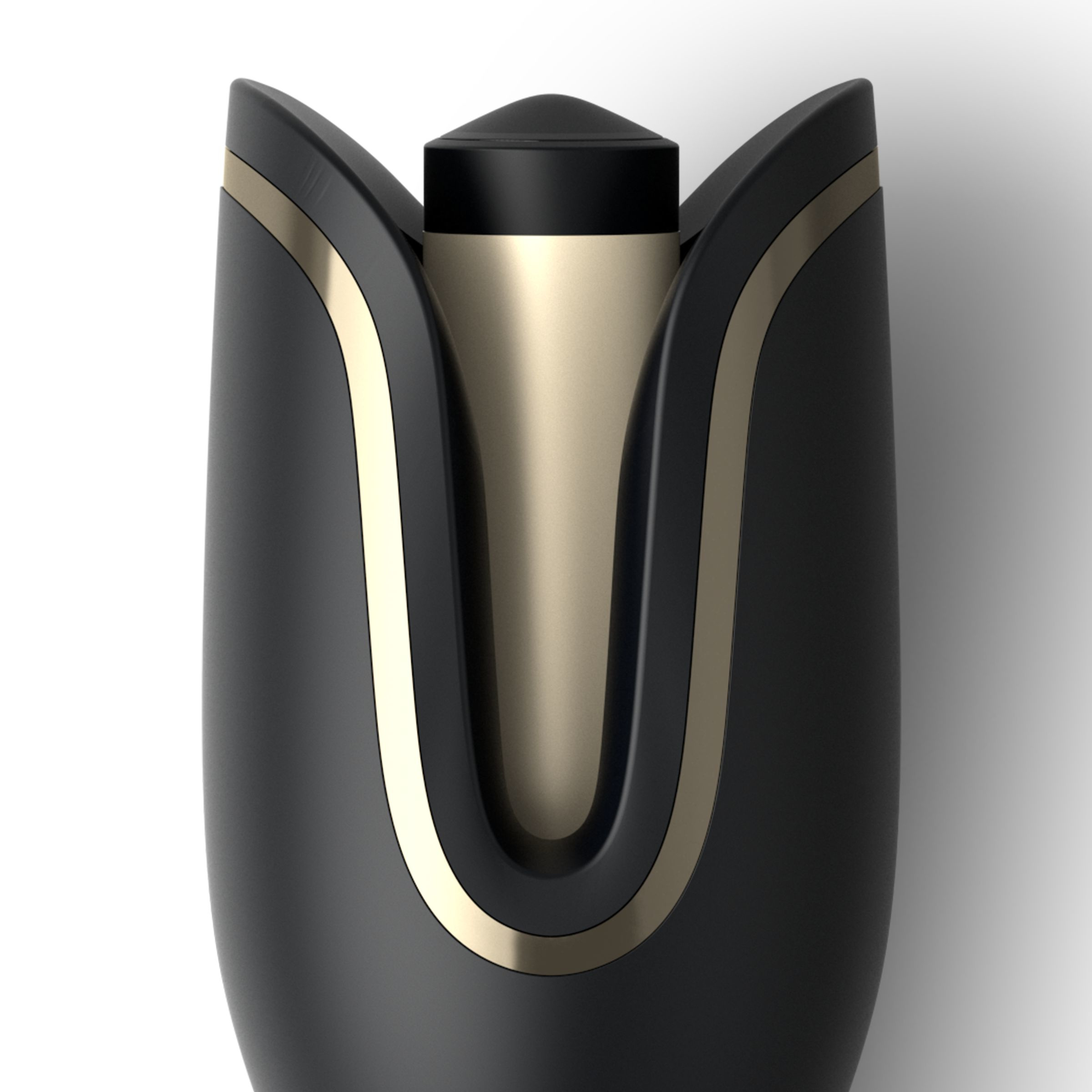 A close-up view of a black and gold hair curler.