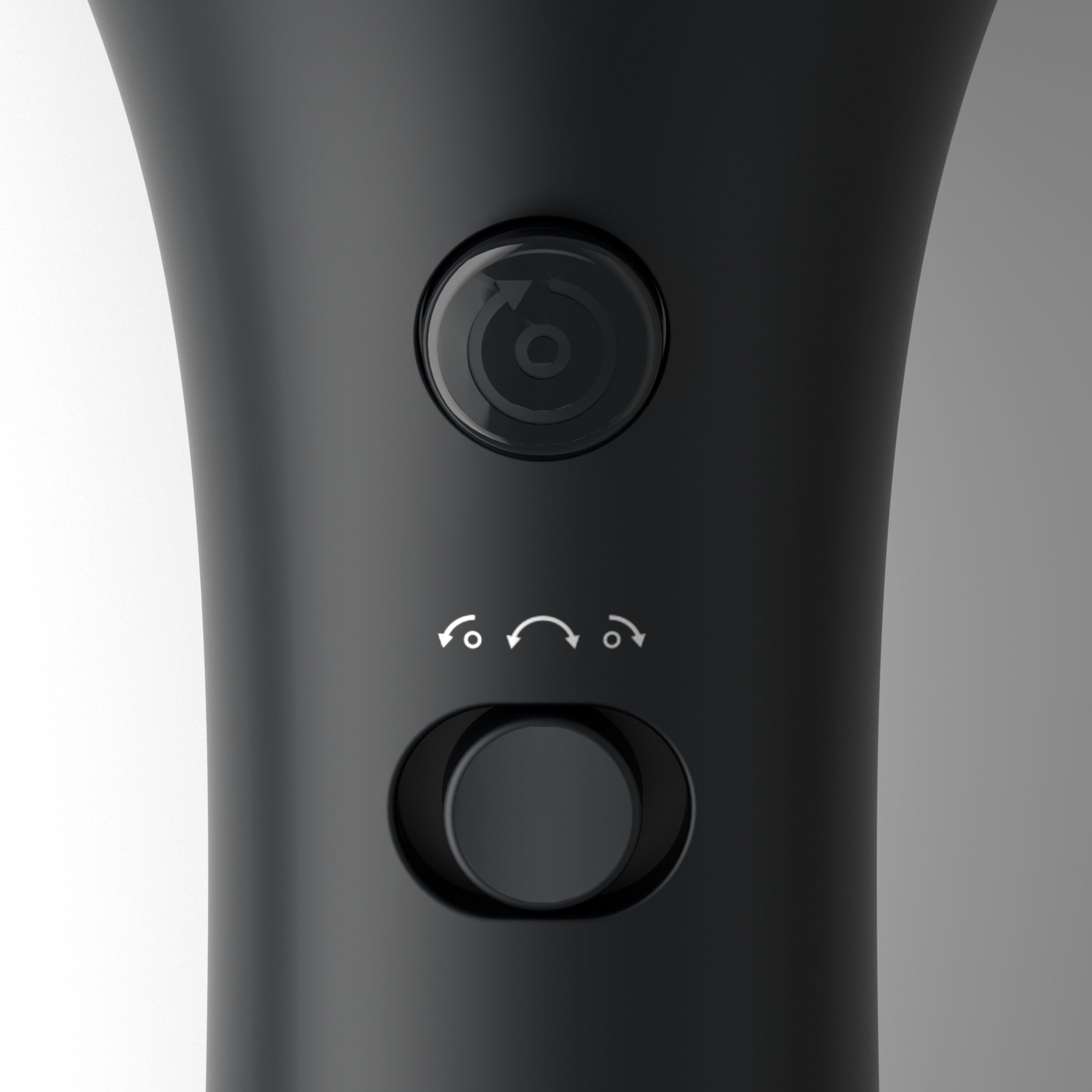 Close-up of a black device with buttons and a dial, arrows indicate functions.