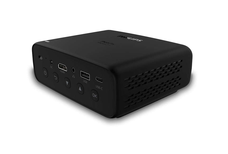 Zwarte, rechthoekige Philips-projector met poorten en knoppen, op witte achtergrond.