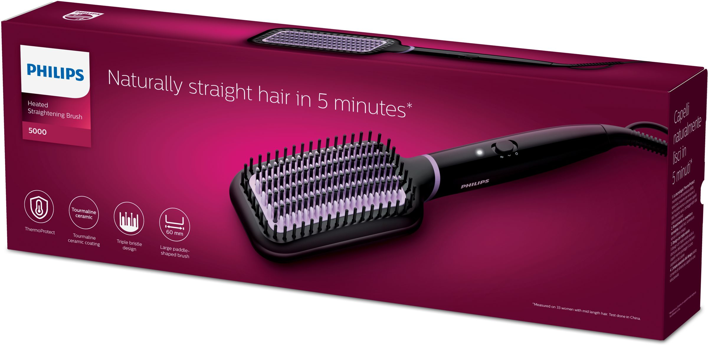 Philips straightening brush in a box. It has a black handle and a purple box.